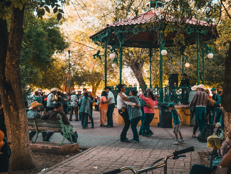 elders, park, dance, casual clothing, city, outdoors, tree, living, mexicans, building exterior, lifestyles, architecture, crowd, culture, built structure