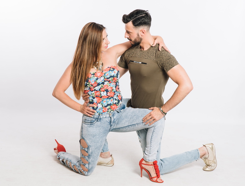 dancers, couple - relationship, arm around, hairstyle, boyfriend, hair, casual clothing, white background, emotion, heterosexual couple, love, two people