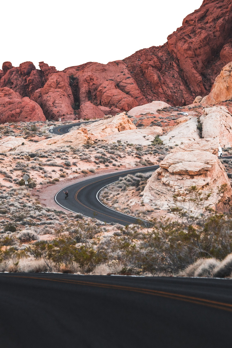 nature, climate, scenics - nature, car, canyon, mountain, person, road, solid, cliff, environment, winding road, formation, tranquil scene, arid climate