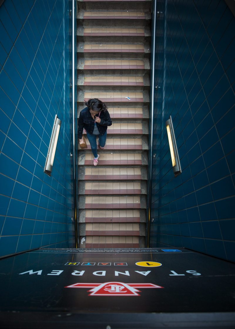 rail, train, step, built structure, walking, platform, tile, stairs, subway, building exterior, sign, station, going, city, walk, urban, representation