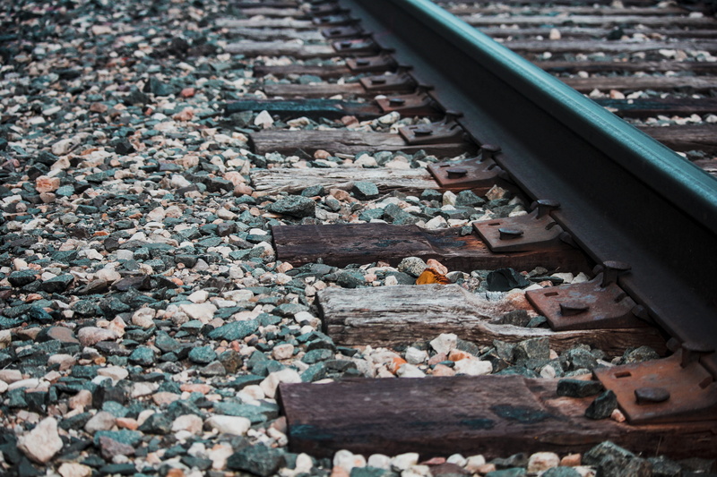 transportation system, track, nature, steel, solid, no people, rail transportation, guidance, selective focus, garbage, pebble, industry, high angle view