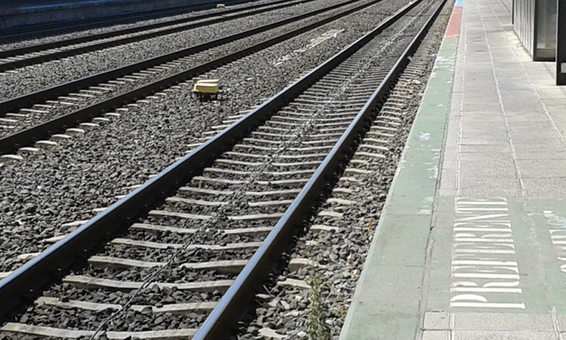 direction, no people, public transportation, destination, railway, platform, train tracks, rails, path, railroad station platform, metal, railroad station