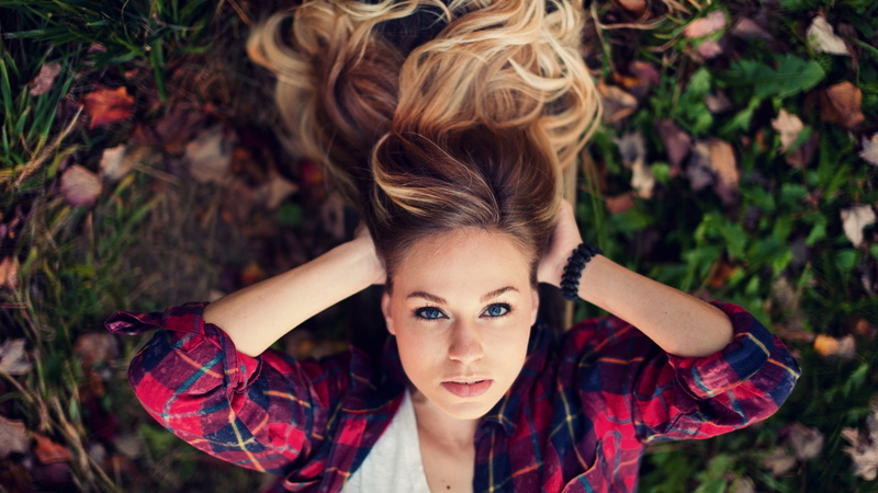 blond hair, human arm, lifestyles, portrait, arms raised, looking at camera, front view, brown hair, blue eyes, girls, leaves, real people, hairstyle, looking at viewer
