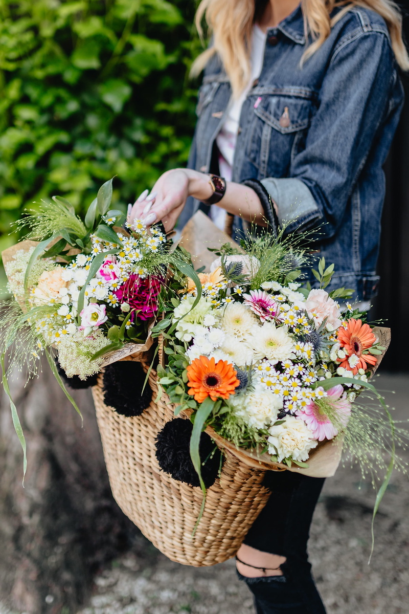 jeans jacket, full, beauty in nature, vulnerability, flower arrangement, jeans, freshness, outdoors, real people, midsection, adult, lovely, raffia basket