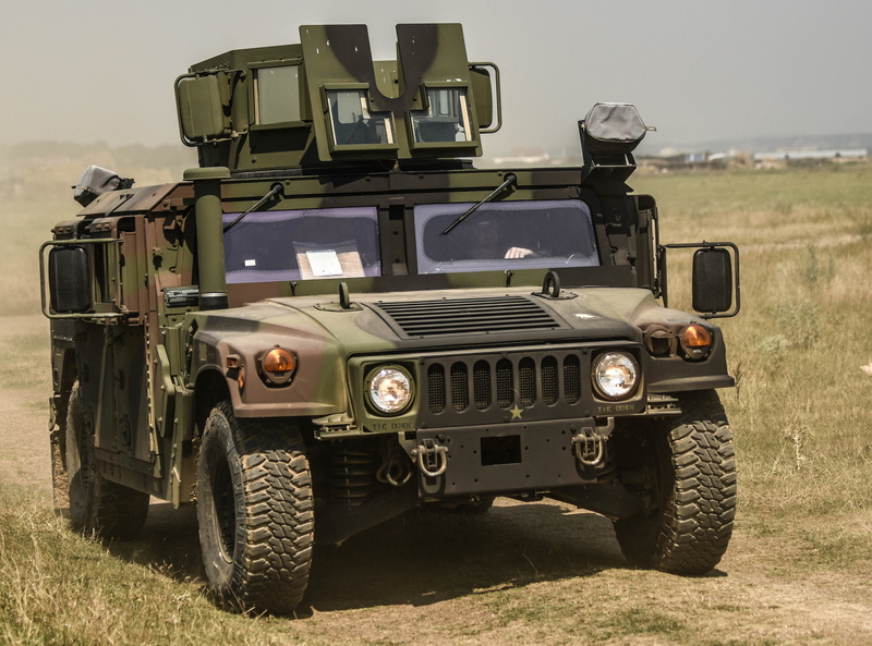 movement, sky, armored, land vehicle, off-road vehicle, military, 4x4, outdoors, no people, mode of transportation, government, technology, stationary