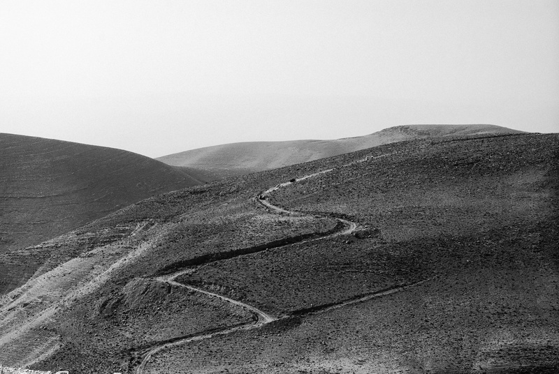 beauty in nature, winding road, nature, desert, remote, rolling landscape, non-urban scene, scenics - nature, zag, road, day, black and white, uphill, offroad