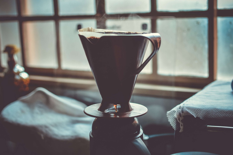 furniture, no people, day, kitchen, table, refreshment, food and drink, focus on foreground, textile, cup, caffeine, home interior, drink, brewed coffee