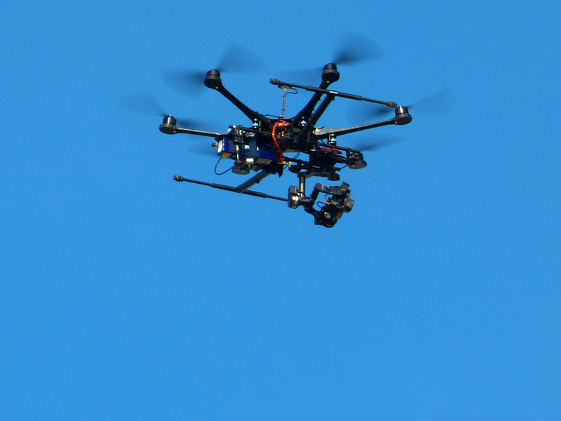 air monitoring, blue, protection, flying, media equipment, surveillance camera, technology, copy space, air vehicle, camera helicopter, security, photography themes