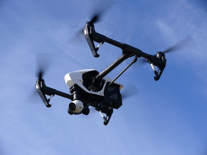 low angle view, cloudy, blue, white, surveillance, transportation, technology, cloud - sky, mid-air, black, camera - photographic equipment, dji, futuristic