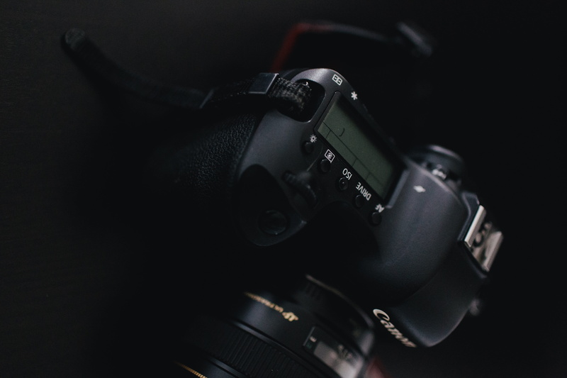 business, indoors, close-up, still life, cd player, photography themes, black color, gun, cushion, technology, electronics, monitor, screen, single object