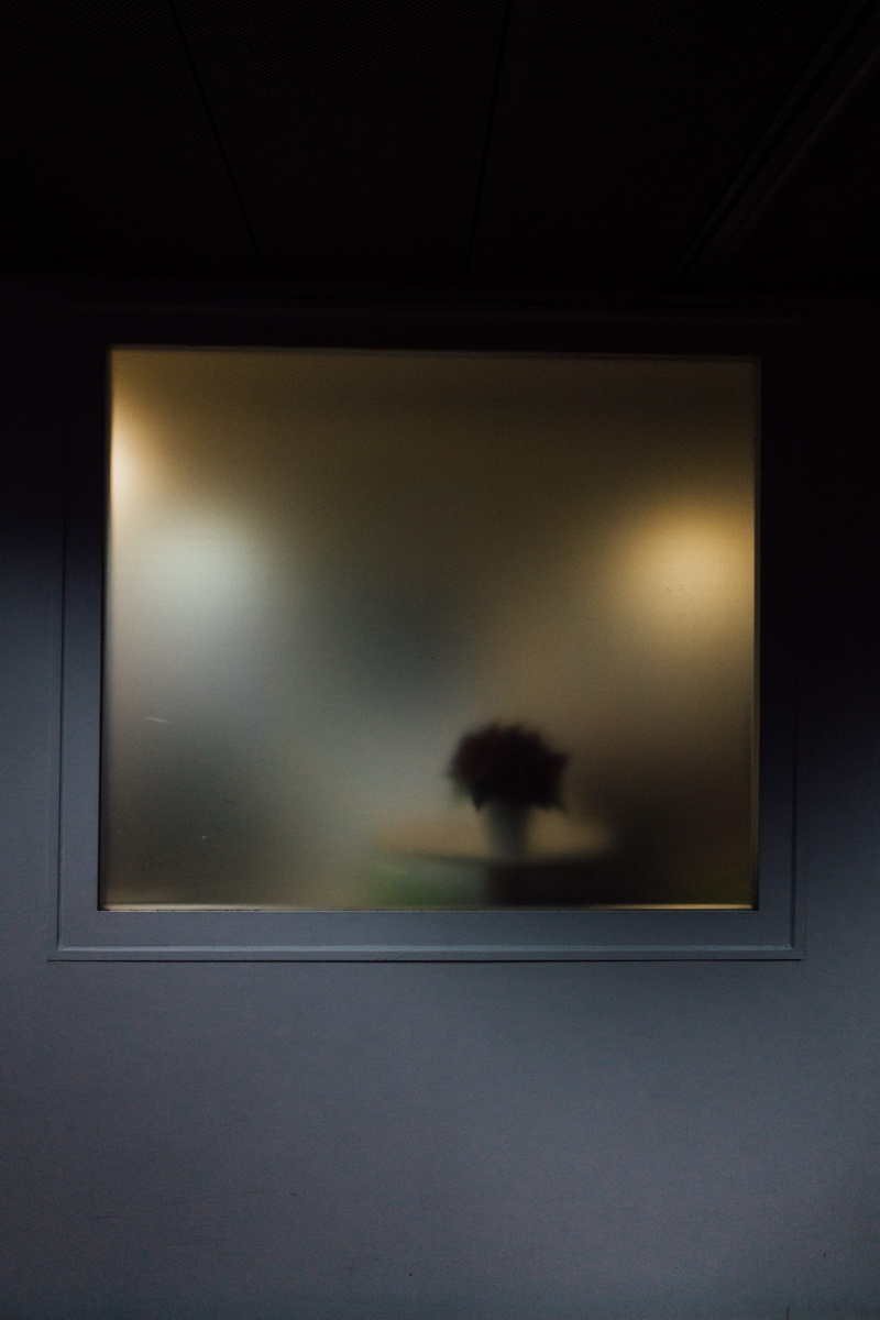 confused, projection, indoors, 5K, device screen, moody, minimal, no people, night, framed, rear view, screen, picture frame, frame, movie, home video camera