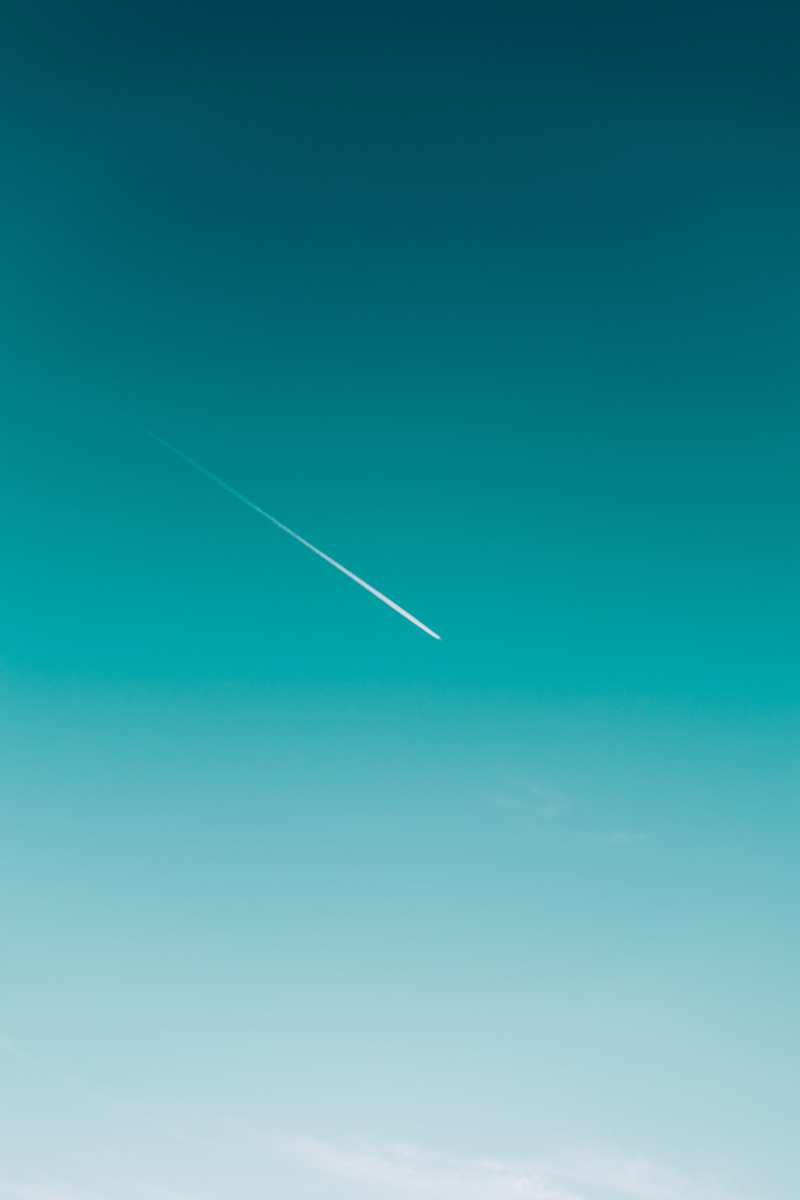 air vehicle, cloud - sky, on the move, motion, blue, outdoors, sky, day, jetplane, travel, low angle view, vapor trail, mode of transportation, airplane