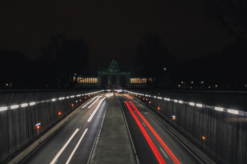 no people, light trail, travel, outdoors, city, light, asphalt, direction, built structure, road marking, marking, overpass, diminishing perspective, tarmac