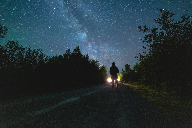 bicycle, night, silhouette, vehicle, person, star, the way forward, plant, outdoors, light, galaxy, space and astronomy, scenics - nature, flare, universe
