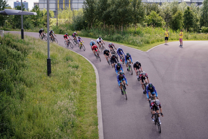 8K, men, sportswear, lifestyles, real people, cycling route, street, crowd, cycle, plant, high angle view, women, day, olympics, gravel, riders, city