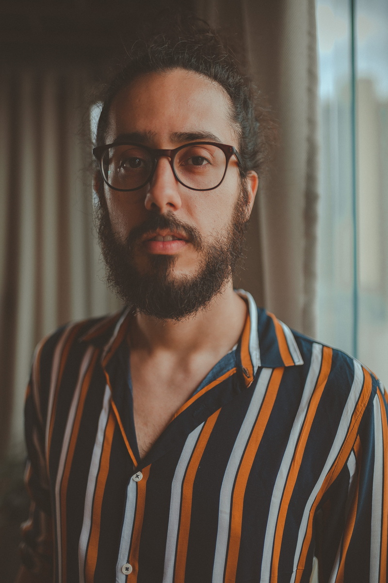 casual, facial hair, standing, fine-looking, mustache, fashionable, looking at camera, indoors, pose, eyewear, looking, facial expression, beard, photoshoot