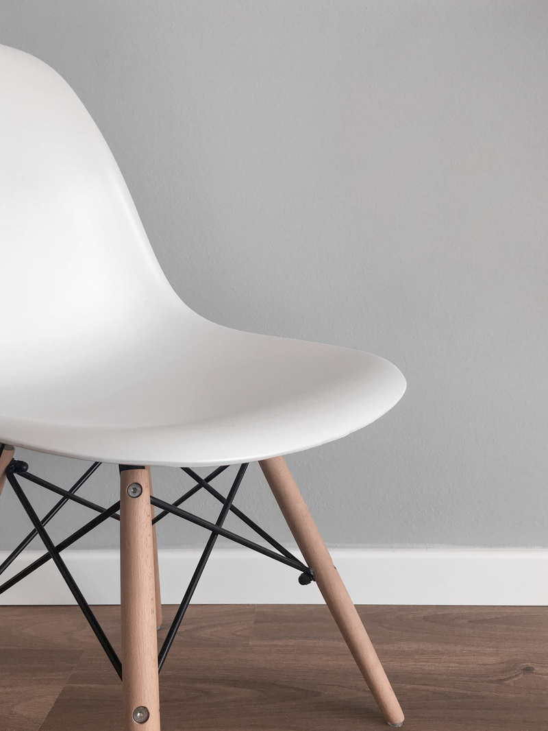 wall - building feature, flooring, home interior, 2K, armless, indoors, seat, hardwood floor, wheel, modern, white, living room, wood, table, no people