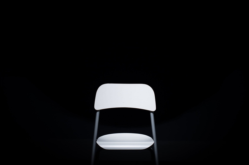 indoors, close-up, simplicity, chair, studio shot, black color, clean, colored background, single object, backrest, illuminated, copy space, black, black background