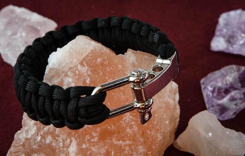 rock, ring, tying, personal accessory, belief, rock - object, protection, security, human body part, metal, rope, art, solid, craft, holding, close-up