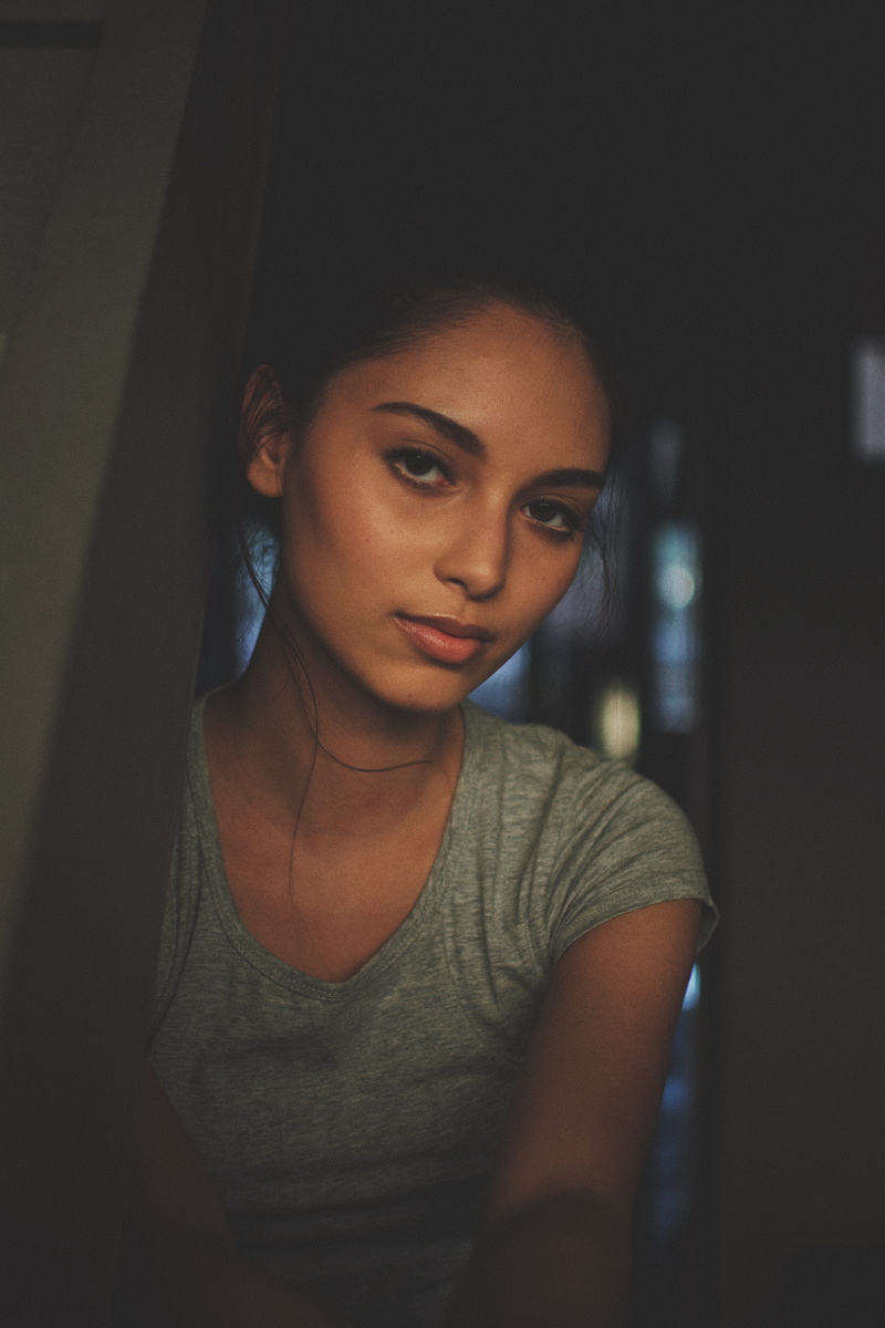 headshot, woman, real people, looking at camera, standing, crew, gray, lifestyles, person, wearing, women, hairstyle, young adult, teenager, portrait, casual clothing
