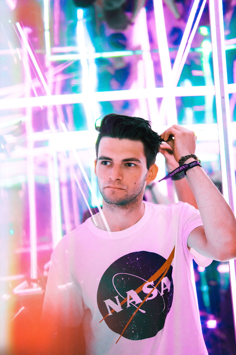 urban Scene, wearing, person, tee, caucasian Ethnicity, looking, flare, males, neon, adult, headshot, neck, night, city Life, athlete, adults Only, portrait