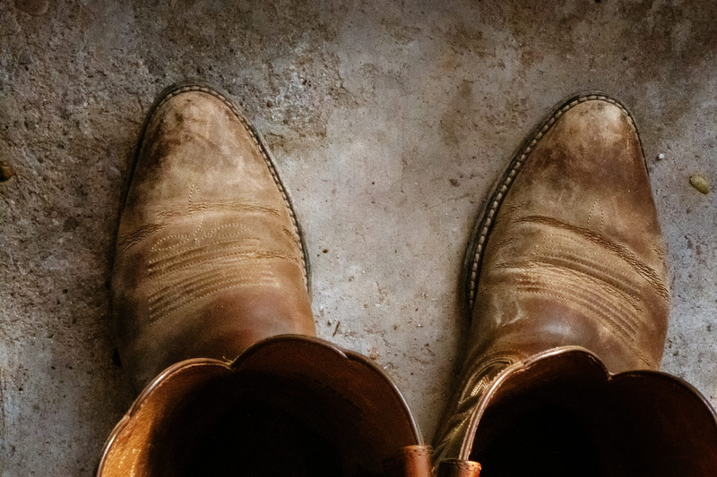 human leg, flooring, human foot, personal perspective, human body part, leather, boot, cowboy, body part, people, shoe, close-up, old, high angle view