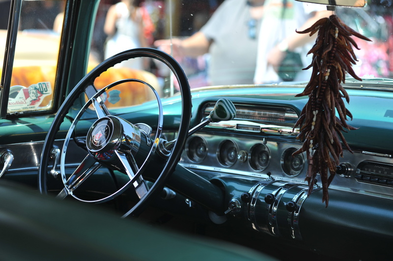 decor, wheel, focus on foreground, luxury, outdoors, retro styled, hanging, city, vehicle, metal, car, vintage car, photo, land vehicle, glass - material