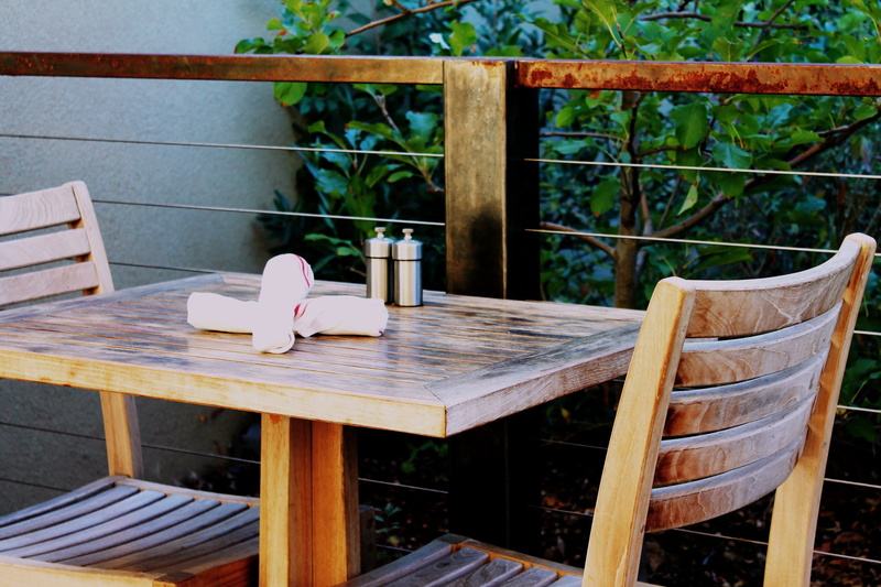 outdoor seating, railing, bistro, architecture, outdoor furniture, mug, seat, lunch, brown, table and chairs, amber avalona, chair, wood - material, cup