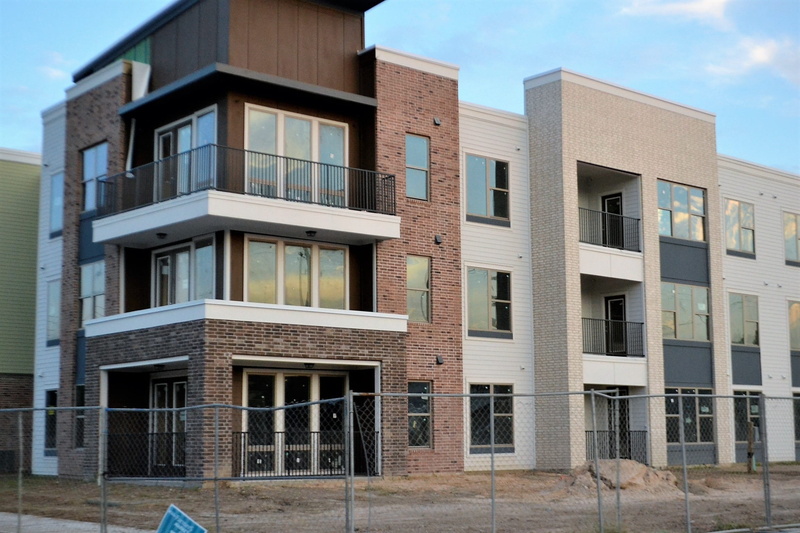 dirt, outdoors, apartment complex, business, apartment, houston texas, modern, city, brown, concrete, glass - material, apartment buildings, housing development