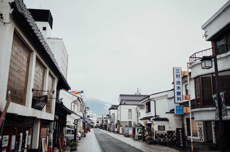 human, built structure, house, city, tarmac, transportation, copy space, walkway, residential district, vacant, asphalt, daytime, sky, outdoors, person