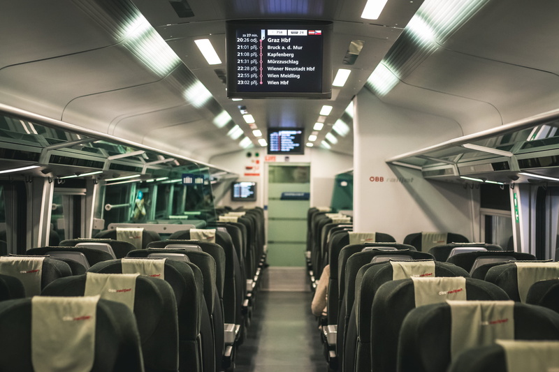 flat, terminal, ceiling, departures, tech, tv, air vehicle, public transportation, mode of transportation, passenger car, furniture, airplane, travel, meeting room