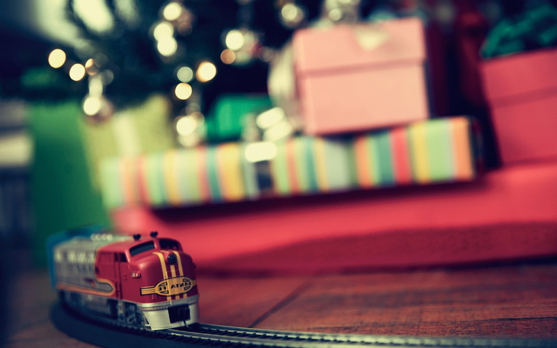 mode of transportation, focus on foreground, technology, illuminated, toy, musical instrument, toy car, train new year presents christmas tree depth of field toys