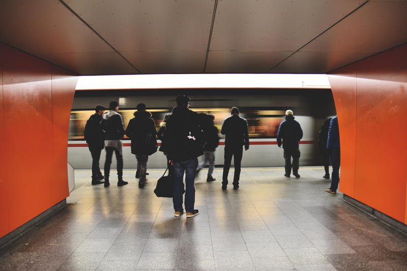 rail transportation, near, lifestyles, public transportation, people, subway platform, walking, adults only, subway station, women, men, rear view, real people