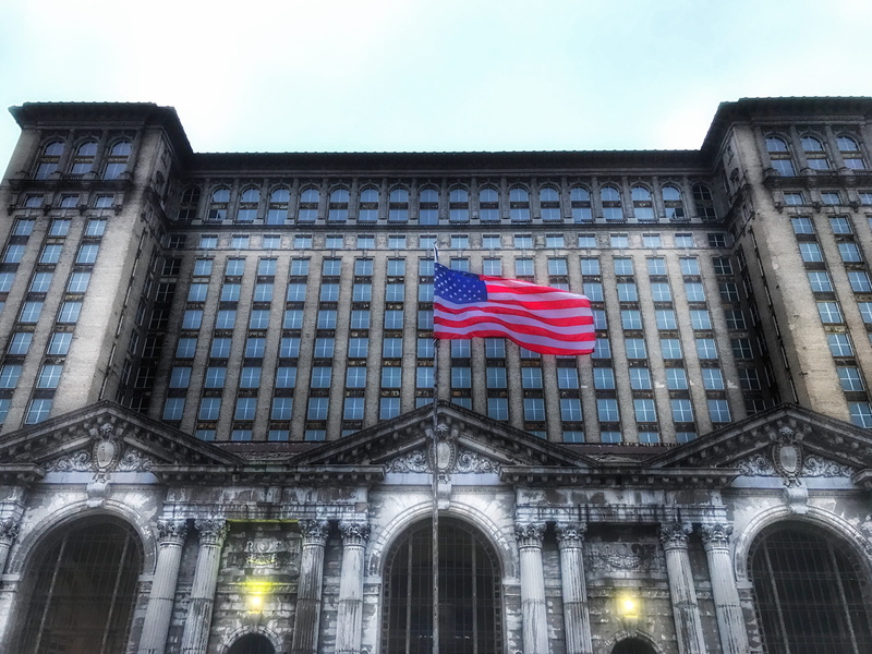 outdoors, train, usa, government, built structure, city, flag, patriotism, trainstation, pride, sky, low angle view, no people, window, detroit, building