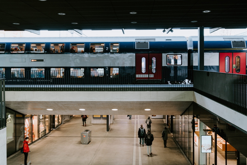 airport, railroad station, airport terminal, incidental people, transportation, public transportation, switzerland, station, city, banister, real people