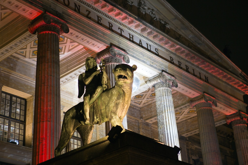 travel destinations, stage lighting, building exterior, nighttime, architectural column, male likeness, statue, religion, Christmas, representation, christmas gendarmenmarkt