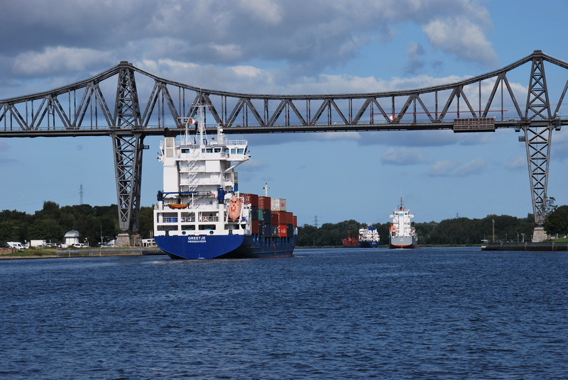 outdoors, passenger craft, built structure, technology, traffic, bridge - man made structure, steel, bridge, waterfront, no people, freight transportation