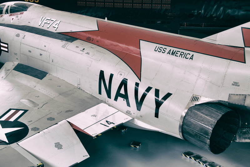 white color, close-up, cockpit, airplane, jet, navy, sign, text, captured, aeroplane, day, information, high angle view, air, capital letter, communication