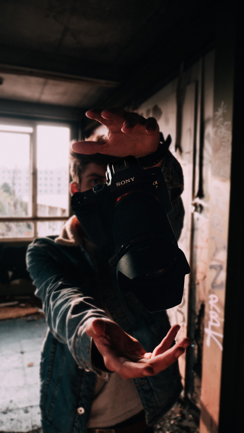 focus on foreground, black, real people, camera gear, levitate, window, light, standing, minimalist, human hand, sonya7, near, camera, architecture, urbex