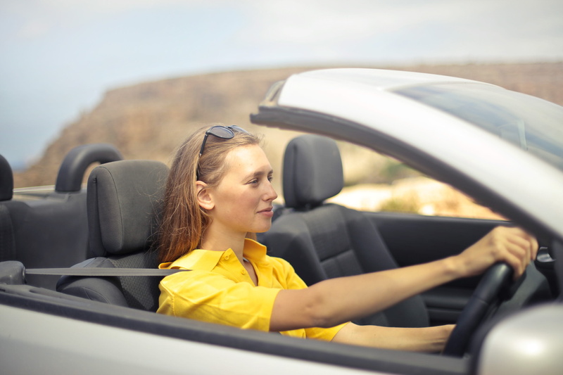 hairstyle, shirt, profile view, women, car, transportation, beautiful woman, silver, sleeved, side view, smiling, happiness, motor vehicle, driver seat