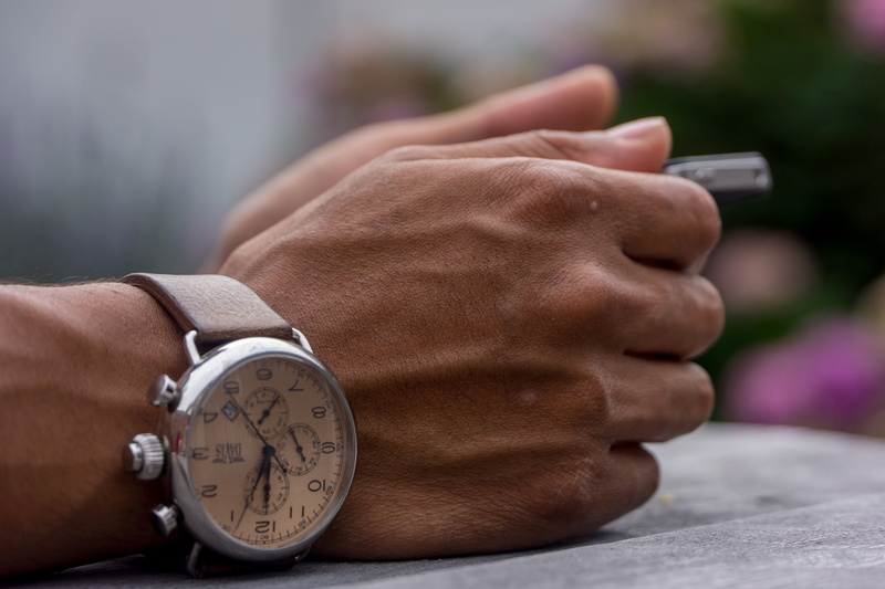 surface, leaning, person, wrist watch, silver, checking the time, one person, wrists, hands, time, arm, human limb, body part, hand, finger, human arm