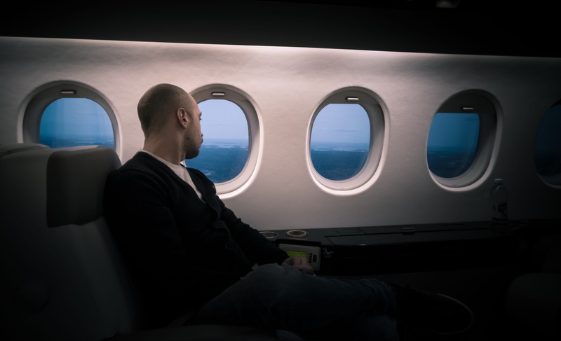 vehicle seat, lifestyles, window, human, travel, face, airplane seat, transport, air vehicle, public transportation, vehicle interior, three quarter length
