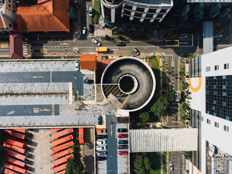 building, concrete, parking lot, no people, city, top view, motor vehicle, metro, day, street, daytime, aerial, infrastructure, photography, car, round