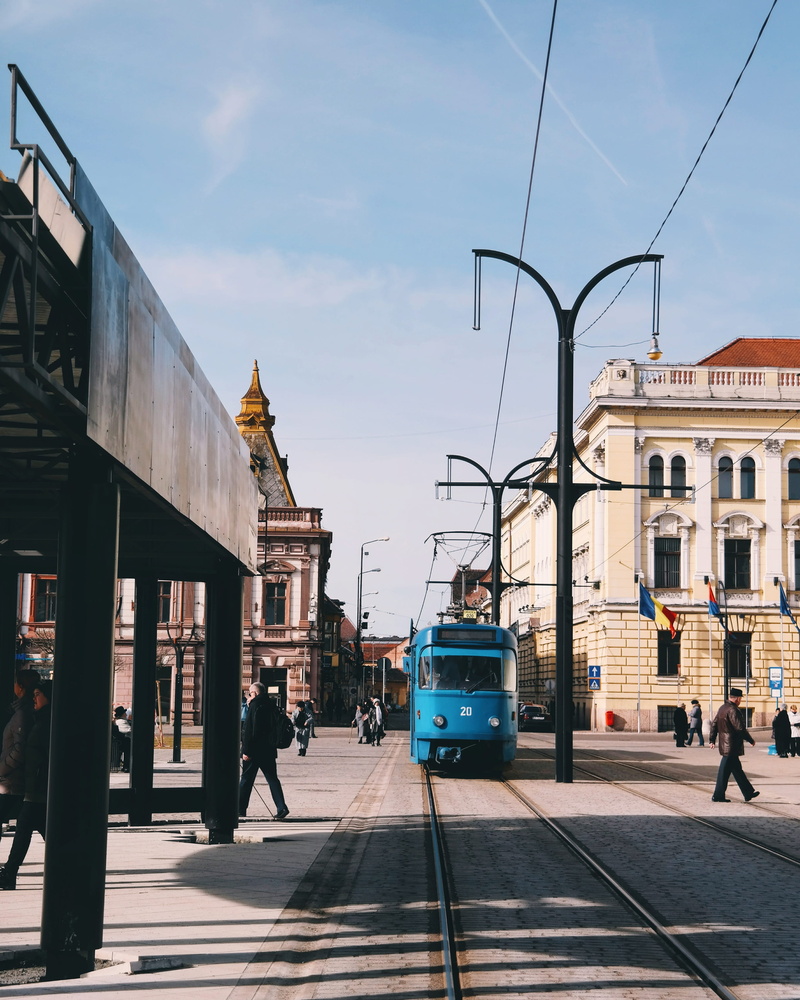 cable car, trolley, building exterior, nature, tram, bus, motor vehicle, metro, tramway, person, sky, car, transportation, 2K, city, built structure, architecture