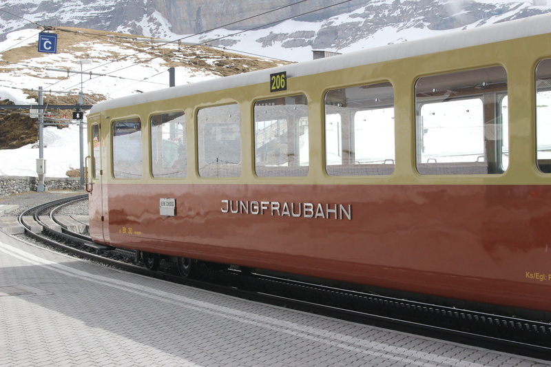 shipping container, transportation, trolley, monorail, railroad track, cable car, railroad station platform, window, furniture, train - vehicle, passenger train