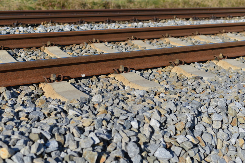 railroad track, day, sunlight, solid, rail transportation, wood - material, metal, surface level, rock, rock - object, transportation, track, 5K, stones