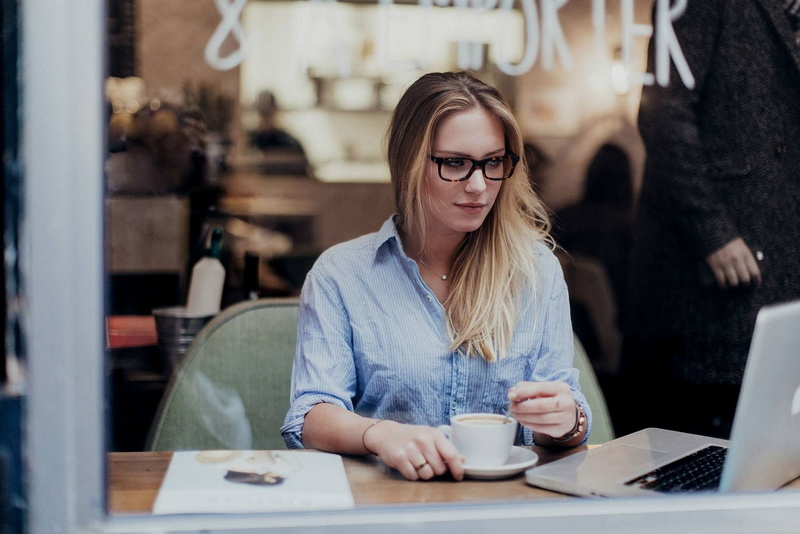 business, laptop, shirt, coffee, Eva Mikulski, blue, cafe, model, coffee shop, drink, young adult, coffee - drink, women, technology, women with glasses