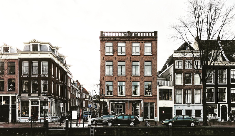 buildings, day, motor vehicle, cars, amsterdam, car, low angle view, bare tree, 2K, row house, nature, apartment, somewhere, brown, built structure, mode of transportation