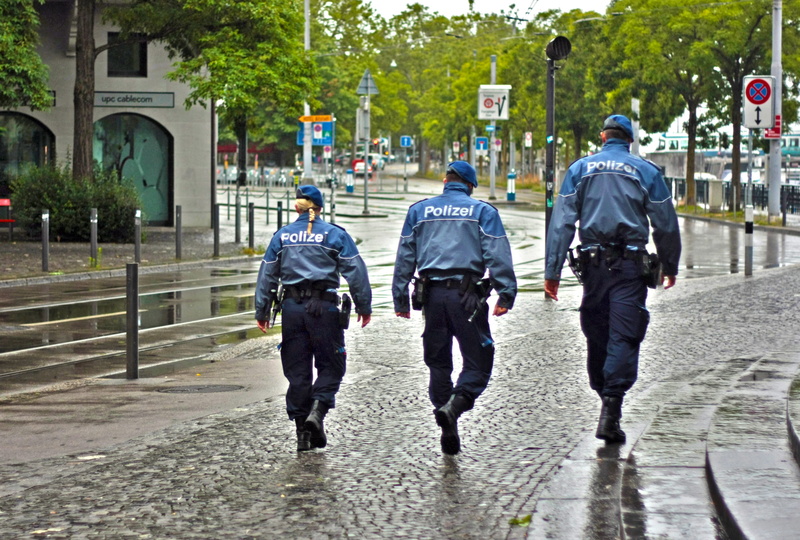 authority, real people, road, group of people, adults only, responsibility, rear view, clothing, funny, police, security, only men, government, men, full length