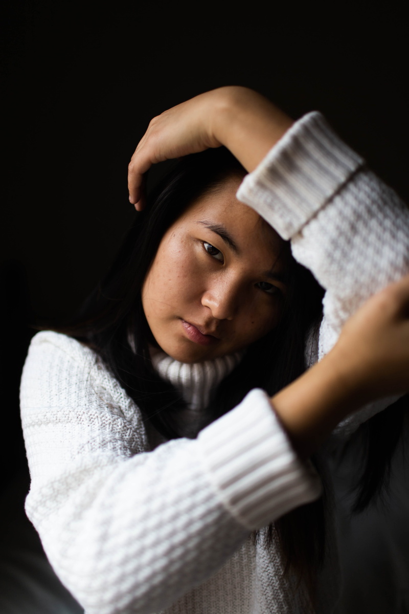 human, one person, beautiful woman, adventure, mouth, waist up, 5K, head, black hair, wood, women, computer, standing, long sleeve, screen, teenager, indoors